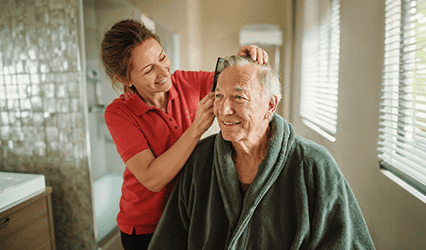 Happy client enjoys grooming personal care service